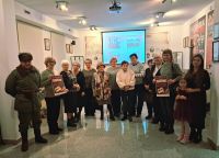 Zdjęcie: osoby uczestniczące w spotkaniu promującym album